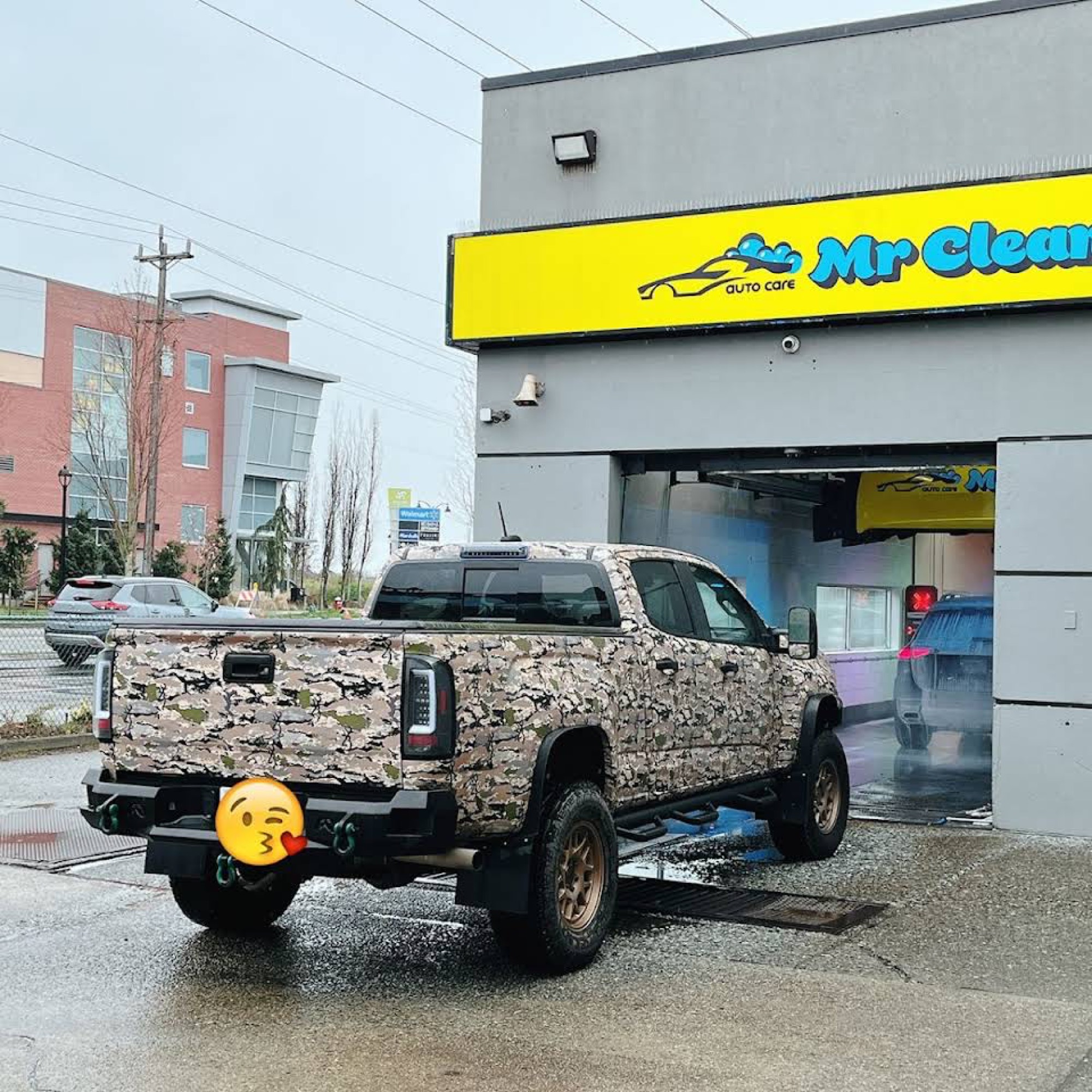 Truck arriving at Mr. Clean Auto Care